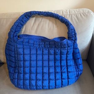 Free people movement quilted carryall in lapis blue. Great condition